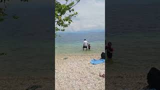 Secluded beach in Kassiopi Greece - view to Albania