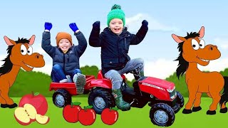 FEEDING WILD PONIES with Sky and Finn | Driving TOY TRACTOR through Puddles Compilation Video