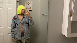 Being pregnant in a bright yellow wig