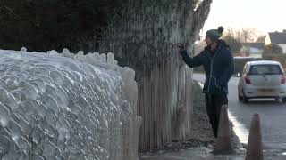 Burst water main creates spectacular ice formation in Gloucestershire