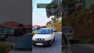 Train crosses road Darjeeling INDIA