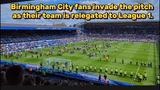 Birmingham City fans invade the pitch as their team is relegated to League 1.