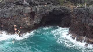 Cliff Jumpers Climbing Back Up Volcanic Rock Wall - End of the World, Big Island, Hawaii