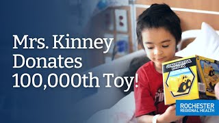 Mrs. Kinney Donates 100,000th Toy - RGH