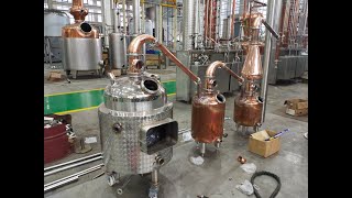 Small size copper still with two copper retorts, two doublers, thumper keg