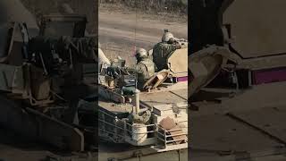 US soldiers with M1A2 Abrams tanks