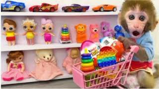 Monkey Baby Bon Bon doing shopping in Kinder Joy Egg store and eat chocolate with puppy#21