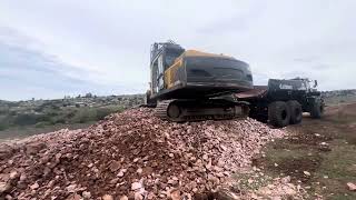 THE BEAST and 2 excavators crushing, stockpiling and loading rock. #terex #hitachi #volvo #excavtor