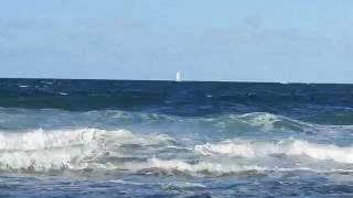 Yacht on the horizon - Mooloolaba Beach Queensland