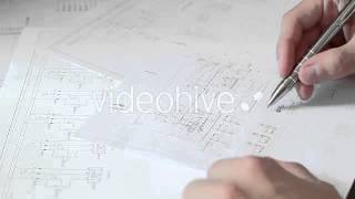 Stock Footage - Engineer Looking For Technical Documents 4 | VideoHive