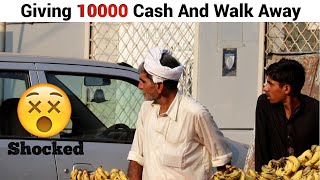 Giving Strangers 10,000 Cash And Walk Away Without Saying A Word