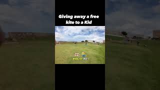 Giving away a free kite to a kid