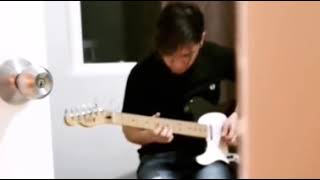 Carlo Aquino playing guitar