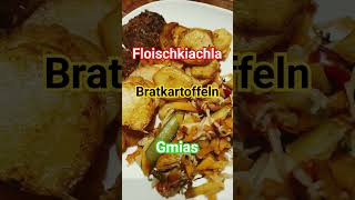 Fleischküchla, Bratkartoffeln und Gemüse