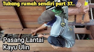 Pasang lantai rumah dari kayu ulin