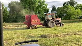 Rolling up and rolling out bales