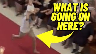 Researching Strange Viral Video of Man in White Shirt Running Through a Church with Child