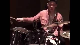 Rich Brian playing drums with Joji